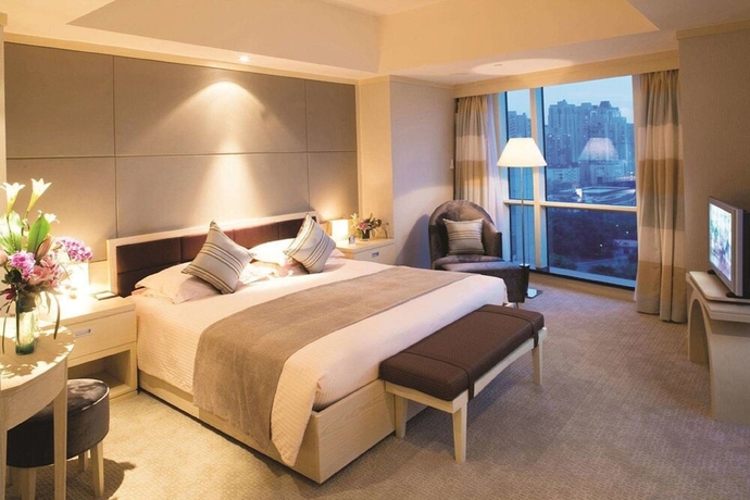 Imagen de la habitación del Hotel Hengshan Garden. Foto 10