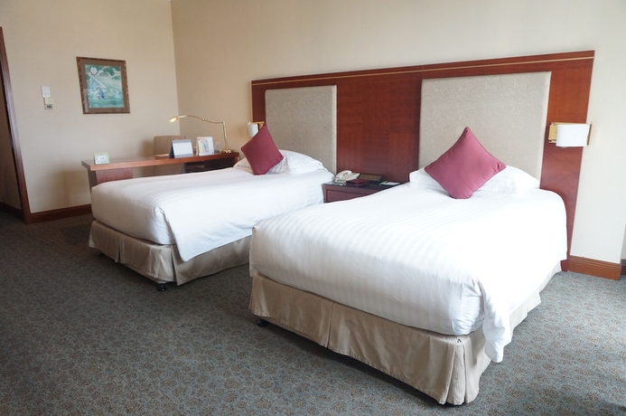 Imagen de la habitación del Hotel Hengshan Garden. Foto 13