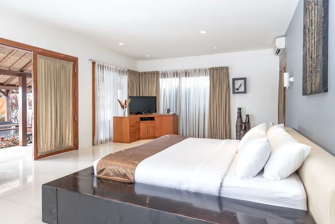 Imagen de la habitación del Hotel Hening Jimbaran. Foto 2