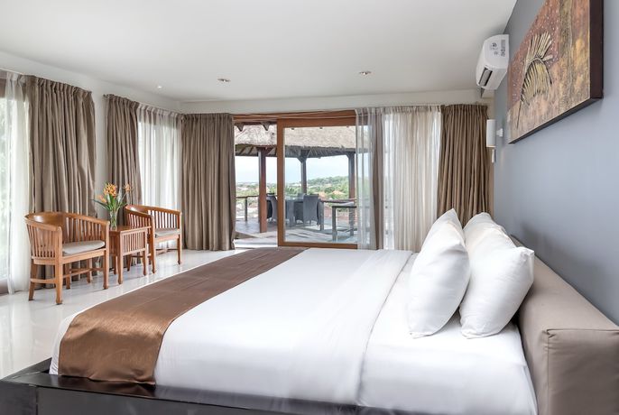Imagen de la habitación del Hotel Hening Jimbaran. Foto 9