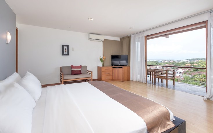 Imagen de la habitación del Hotel Hening Jimbaran. Foto 10