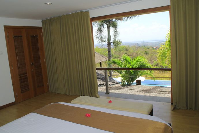 Imagen de la habitación del Hotel Hening Jimbaran. Foto 11