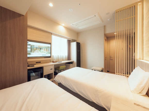 Imagen de la habitación del Hotel Henn Na Premier Sendai Kokubuncho. Foto 5