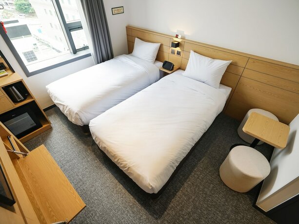 Imagen de la habitación del Hotel Henn Na Seoul Myeongdong. Foto 11