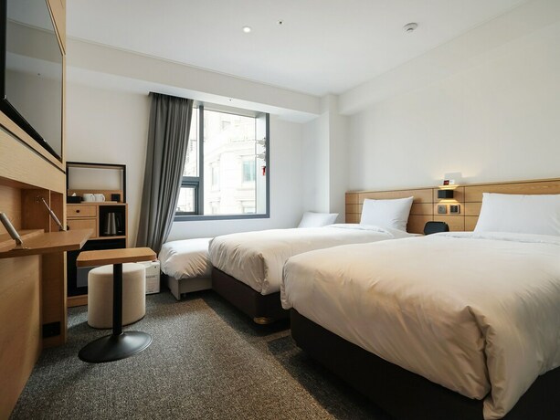 Imagen de la habitación del Hotel Henn Na Seoul Myeongdong. Foto 12