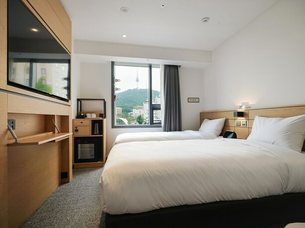 Imagen de la habitación del Hotel Henn Na Seoul Myeongdong. Foto 13