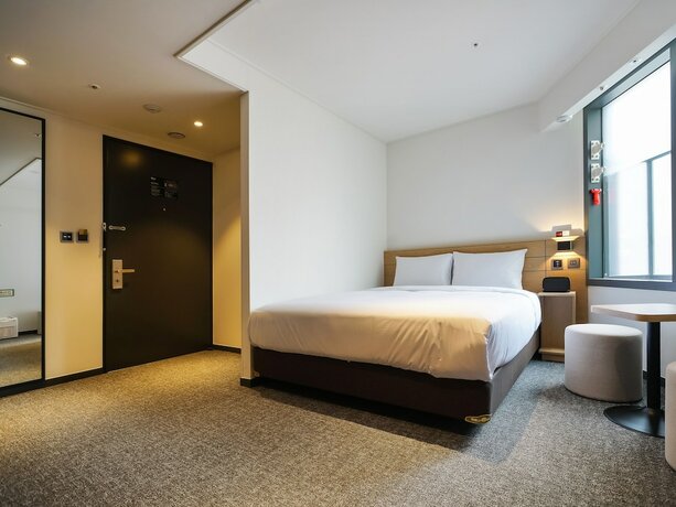 Imagen de la habitación del Hotel Henn Na Seoul Myeongdong. Foto 14