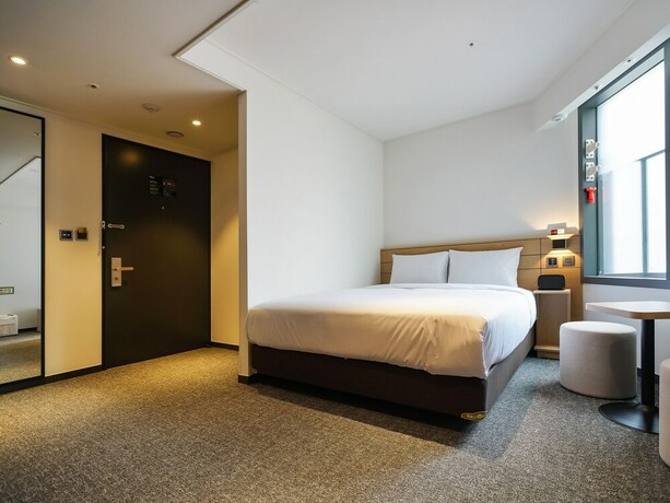 Imagen de la habitación del Hotel Henn Na Seoul Myeongdong. Foto 15