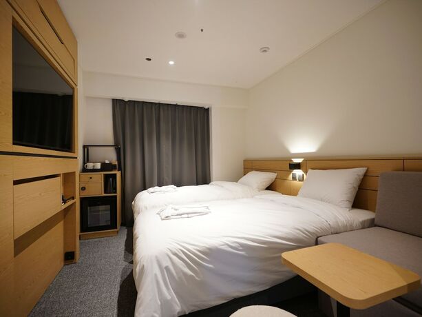 Imagen de la habitación del Hotel Henn Na Seoul Myeongdong. Foto 17