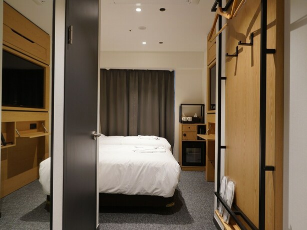 Imagen de la habitación del Hotel Henn Na Seoul Myeongdong. Foto 24