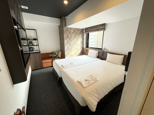 Imagen de la habitación del Hotel Henn Na Tokyo Akasaka. Foto 14