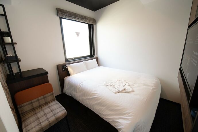 Imagen de la habitación del Hotel Henn Na Tokyo Akasaka. Foto 19