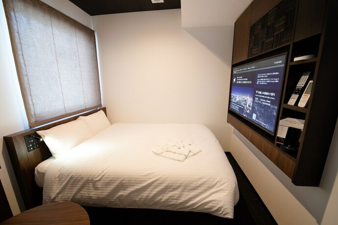 Imagen de la habitación del Hotel Henn Na Tokyo Akasaka. Foto 20