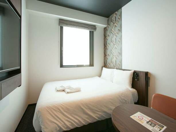 Imagen de la habitación del Hotel Henn Na Tokyo Akasaka. Foto 22