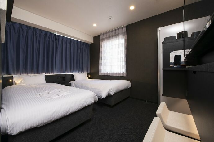 Imagen de la habitación del Hotel Henn Na Tokyo Asakusabashi. Foto 13