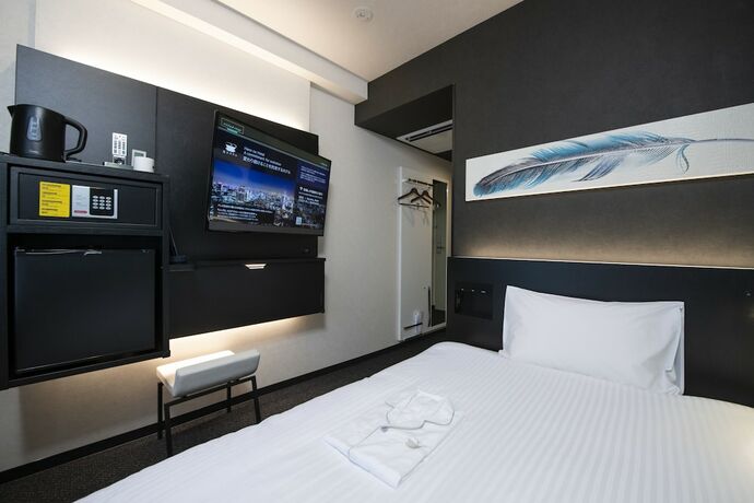 Imagen de la habitación del Hotel Henn Na Tokyo Asakusabashi. Foto 18