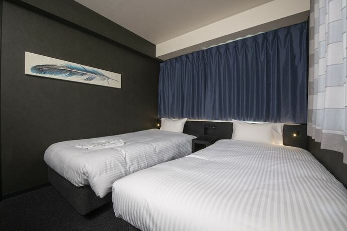 Imagen de la habitación del Hotel Henn Na Tokyo Asakusabashi. Foto 19