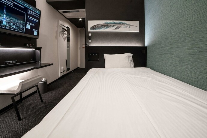 Imagen de la habitación del Hotel Henn Na Tokyo Asakusabashi. Foto 32