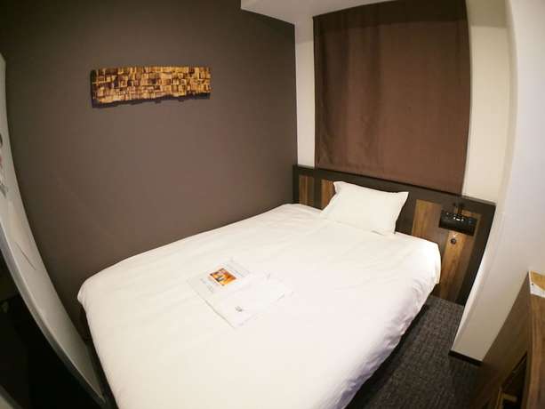 Imagen de la habitación del Hotel Henn Na Tokyo Ginza. Foto 14