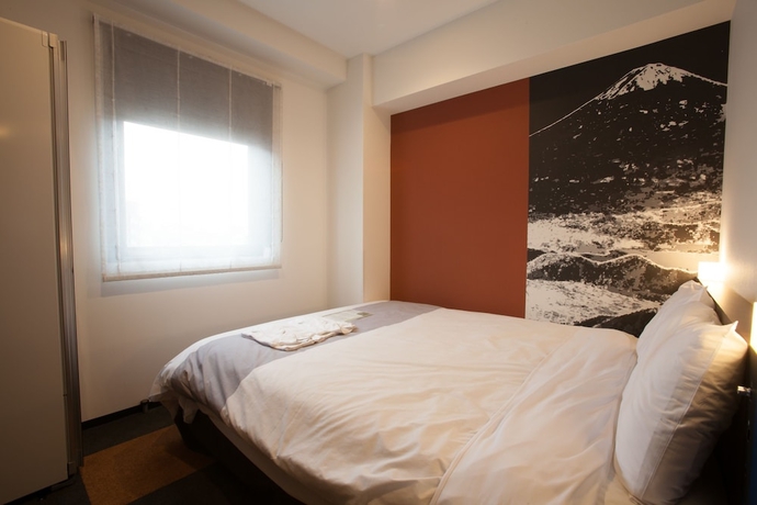 Imagen de la habitación del Hotel Henn Na Tokyo Haneda. Foto 9