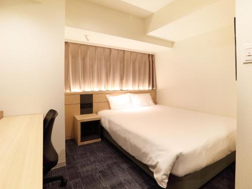 Imagen de la habitación del Hotel Henn na Express Nagoya Fushimiekimae. Foto 8