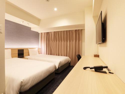 Imagen de la habitación del Hotel Henn na Express Nagoya Fushimiekimae. Foto 9