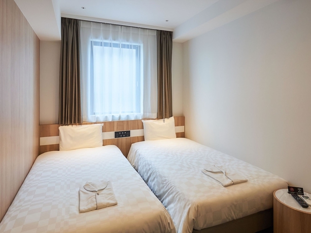 Imagen de la habitación del Hotel Henna Komatsu Ekimae. Foto 2