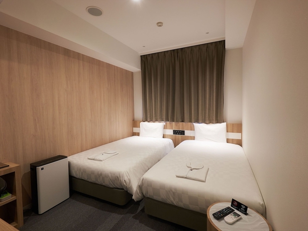 Imagen de la habitación del Hotel Henna Komatsu Ekimae. Foto 3