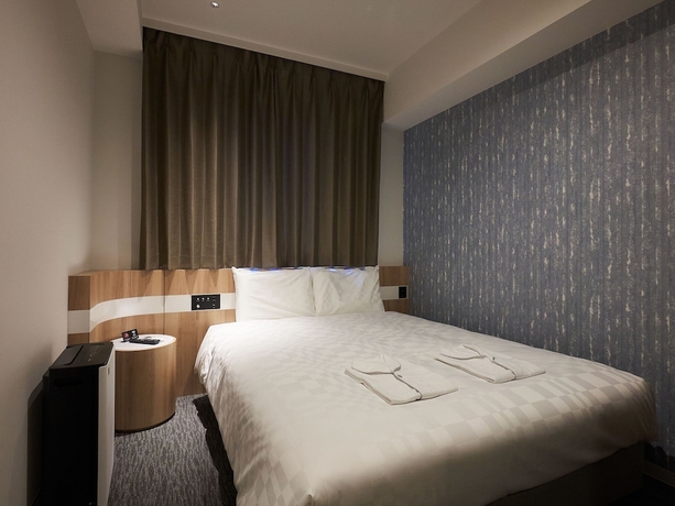Imagen de la habitación del Hotel Henna Komatsu Ekimae. Foto 5