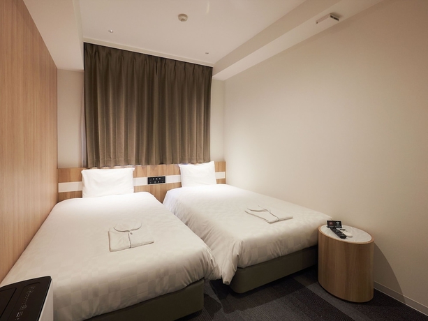 Imagen de la habitación del Hotel Henna Komatsu Ekimae. Foto 9