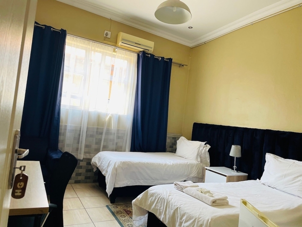 Imagen de la habitación del Hotel Henry George Guest House. Foto 6