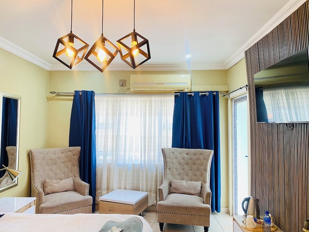 Imagen de la habitación del Hotel Henry George Guest House. Foto 9