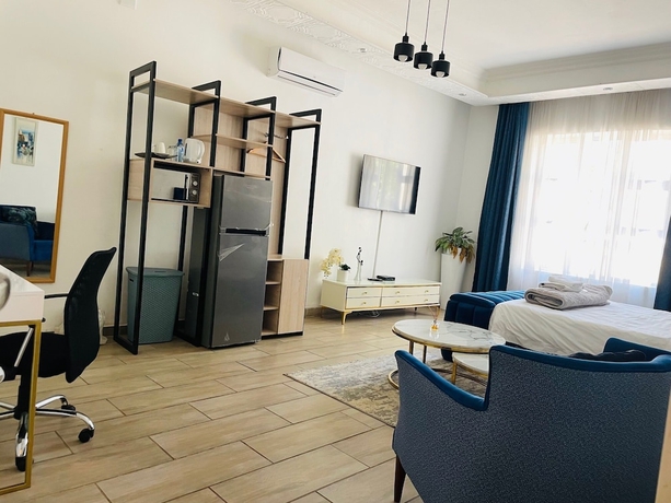 Imagen de la habitación del Hotel Henry George Guest House. Foto 12