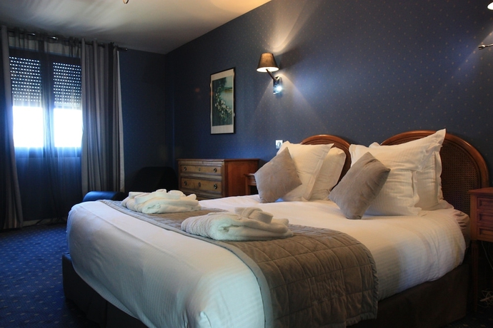 Imagen de la habitación del Hotel Henry Ii. Foto 8