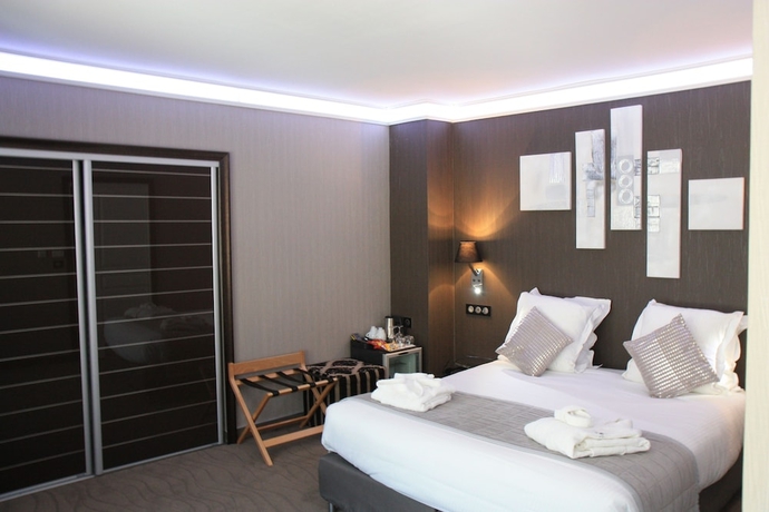 Imagen de la habitación del Hotel Henry Ii. Foto 13