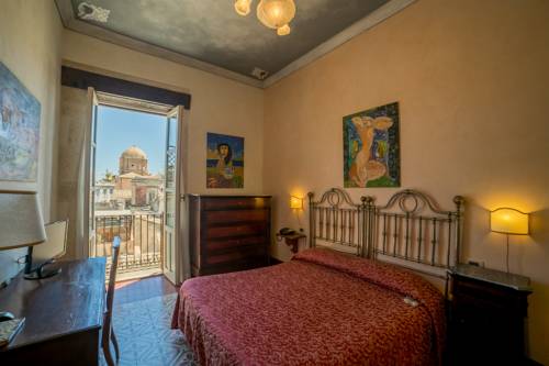 Imagen de la habitación del Hotel Henry's House. Foto 2