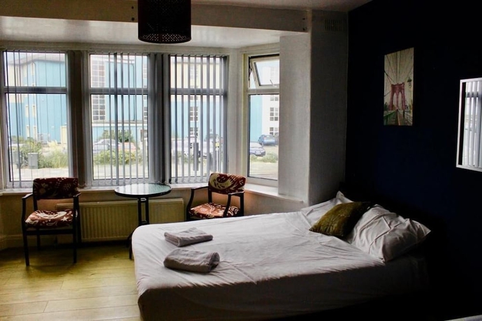 Imagen de la habitación del Hotel Henson. Foto 11