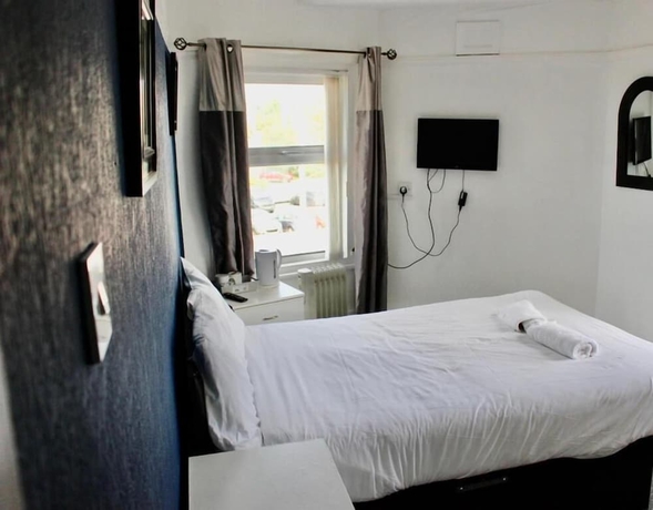 Imagen de la habitación del Hotel Henson. Foto 12