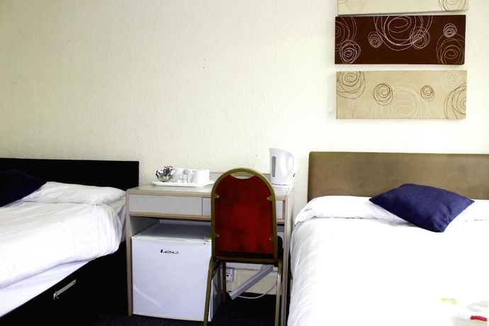 Imagen de la habitación del Hotel Henson. Foto 13
