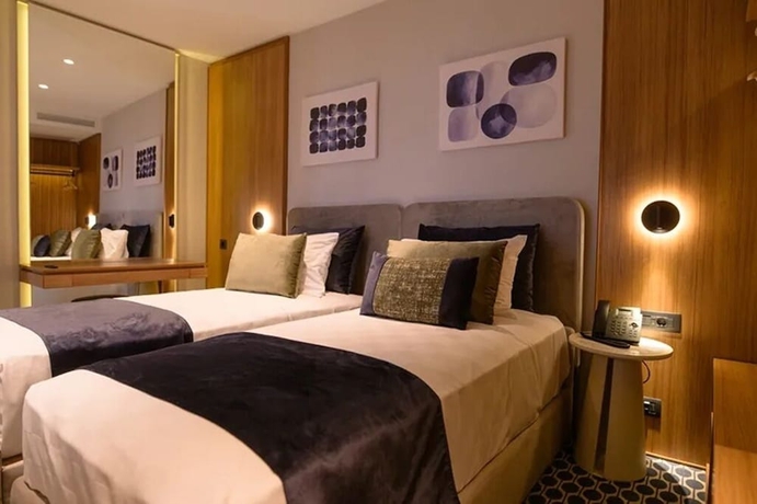 Imagen de la habitación del Hotel Hera Axd. Foto 2