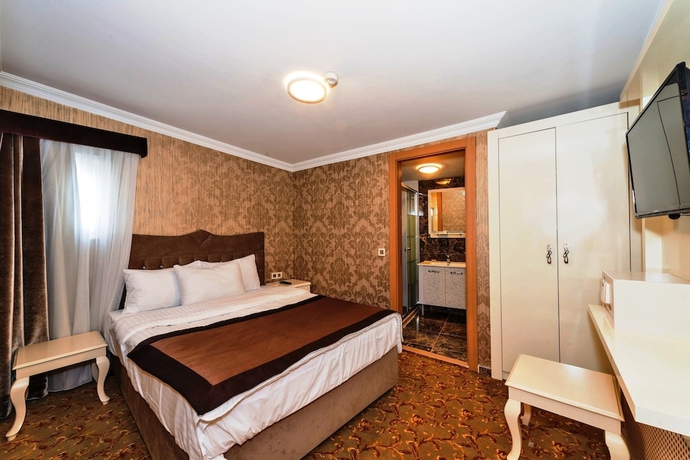 Imagen de la habitación del Hotel Hera Montagna. Foto 9