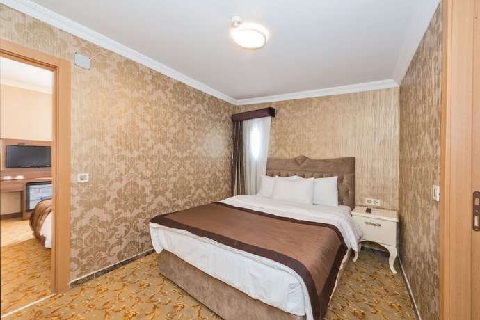 Imagen de la habitación del Hotel Hera Montagna. Foto 11