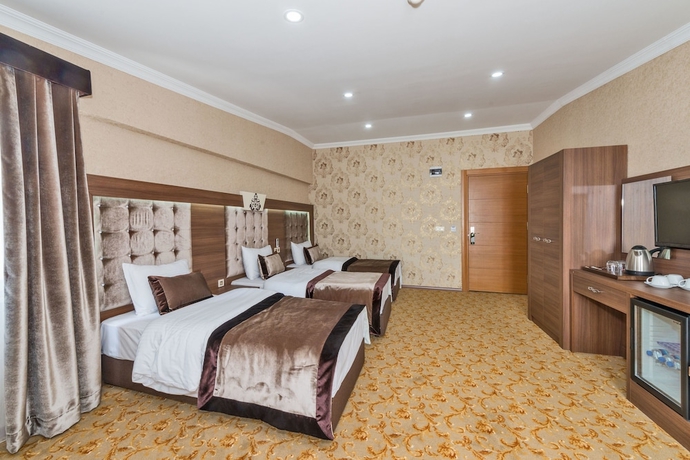 Imagen de la habitación del Hotel Hera Montagna. Foto 12