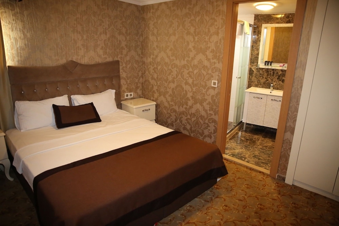 Imagen de la habitación del Hotel Hera Montagna. Foto 14