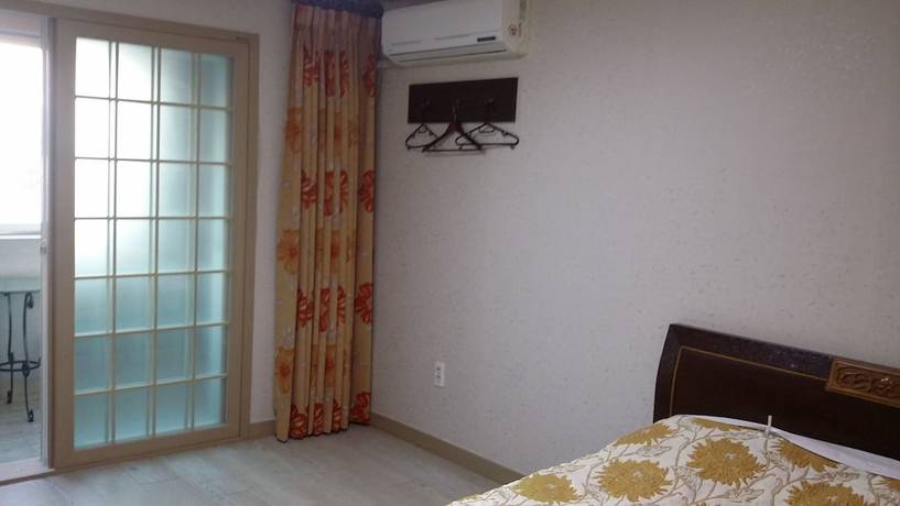 Imagen de la habitación del Hotel Hera, Seogwipo. Foto 6