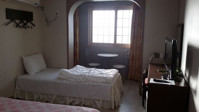 Imagen de la habitación del Hotel Hera, Seogwipo. Foto 7