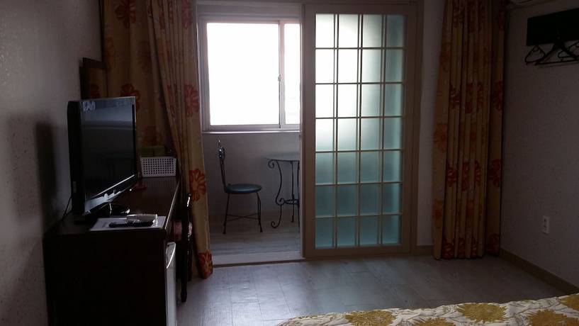 Imagen de la habitación del Hotel Hera, Seogwipo. Foto 9