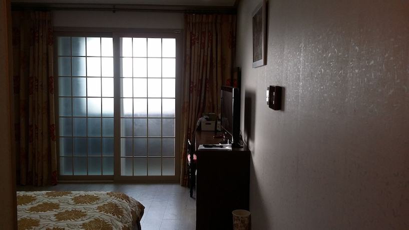 Imagen de la habitación del Hotel Hera, Seogwipo. Foto 12