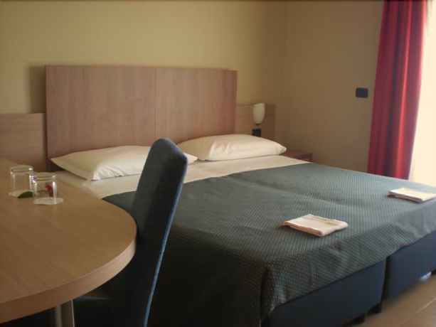 Imagen de la habitación del Hotel Heraclea Residence. Foto 2