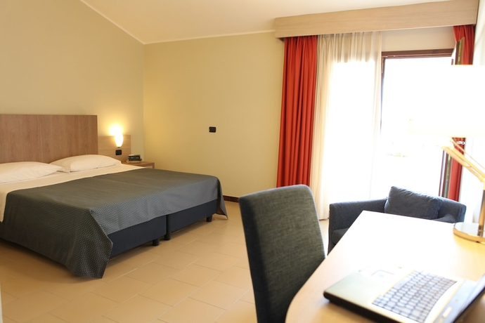 Imagen de la habitación del Hotel Heraclea Residence. Foto 8